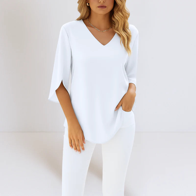 Nora | Elegante blusa con escote en pico y mangas con abertura