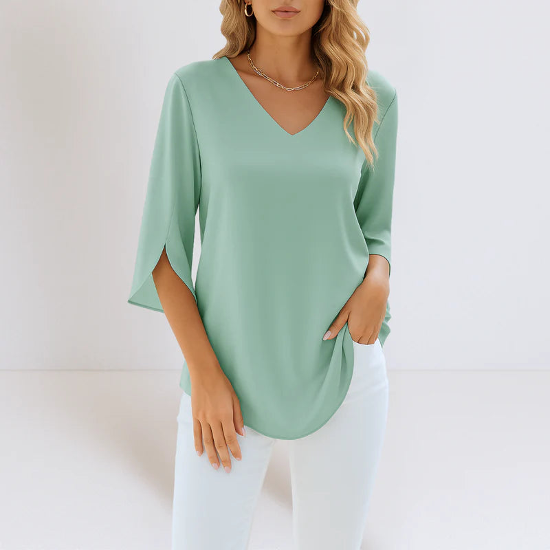 Nora | Elegante blusa con escote en pico y mangas con abertura